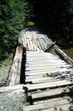 Bridge washout area w/Sauk River and mountains